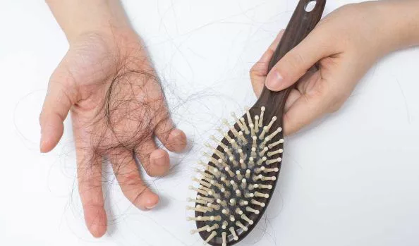 cách xử lý bị rụng tóc khi mang bầu là gì